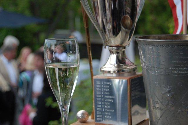 Fore In One champagne and trophies photo